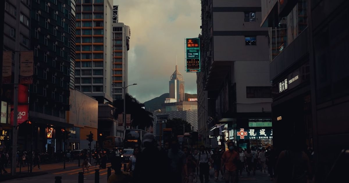 Person Wishing for Success in City Lights VFX Prompt