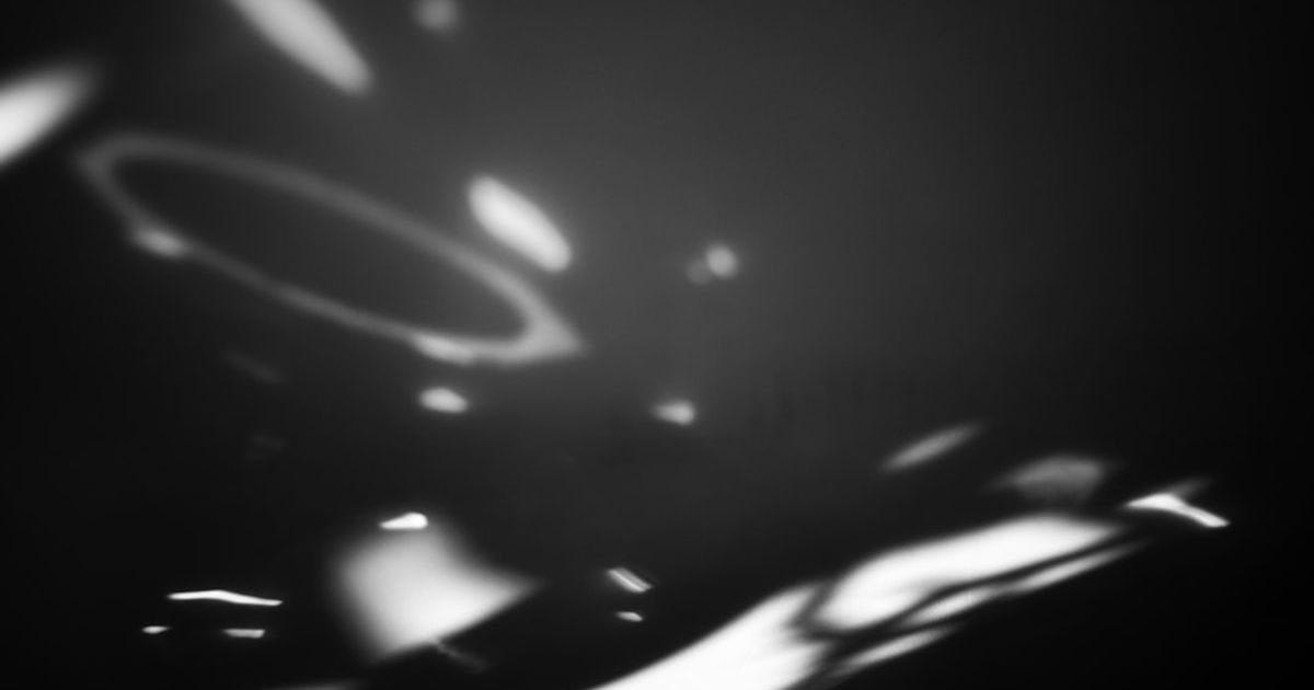 Soft Particle Drift with Bokeh Effect ASMR VFX Prompt